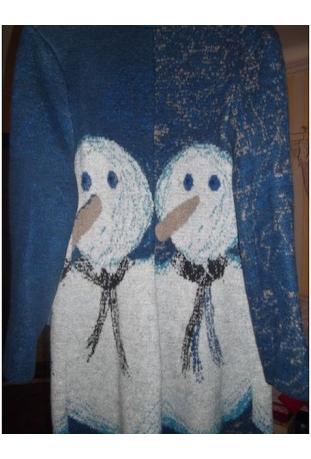 LOUISE DELLA : manteau modèle "Boule de neige" automne/hiver 2011-2012